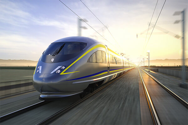 rendering of high-speed rail train on tracks at dusk