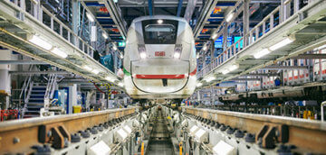 high-speed rail train shell above maintenance tracks