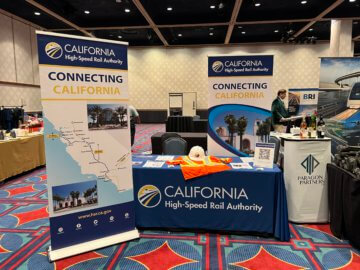 California High-Speed Rail Outreach booth with pop-up banners, hardhat and construction vest and handout materials. 