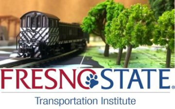 Photo of a model train running alongside small plastic toy trees. Photo includes logo that reads Fresno State Transportation Institute. 