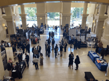 Overhead shot of attendees and the various booths at the Small Business Fast-Track Networking Event and Industry Update.