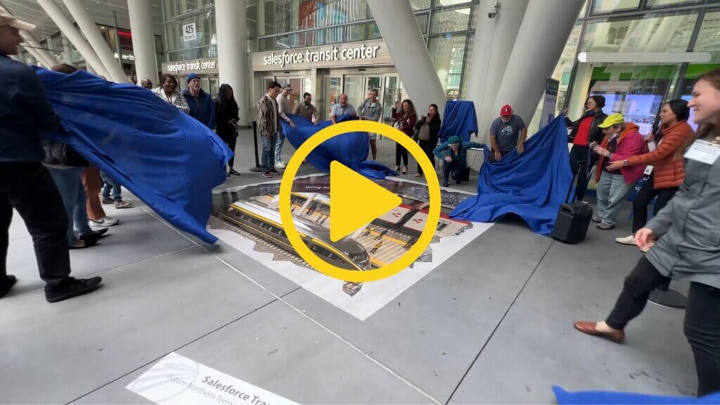 Screenshot of the California High-Speed Rail Authority's Video Release showcasing a 3D Public Art demonstrating the future high-speed rail at the SalesForce Transit Center. 