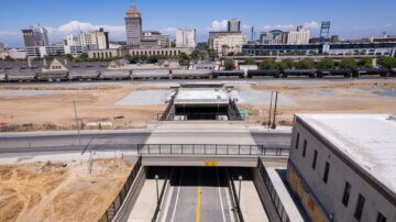 Aerial view of Tulare Street Underpass in Fresno with Downtown Fresno in the background.